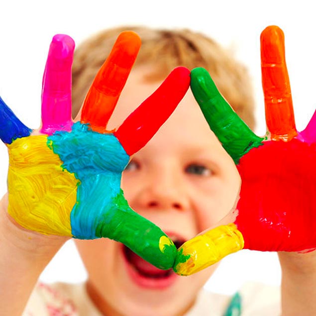 a kid with paint on his hands