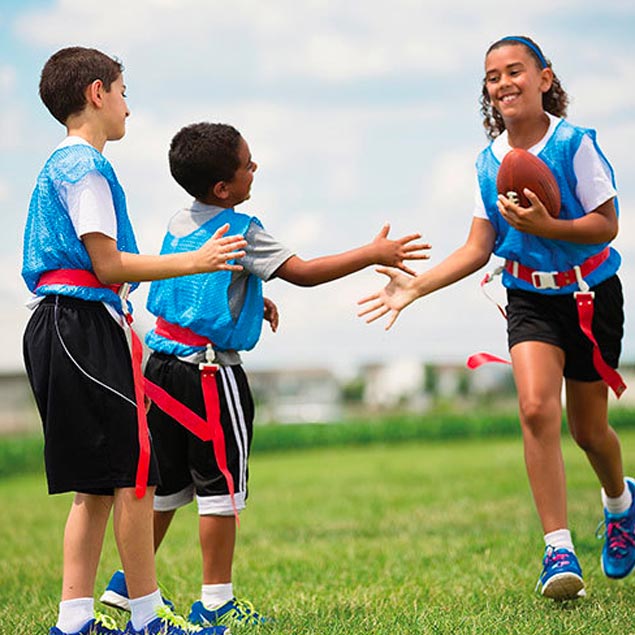 kids participating in an NFL flag football league
