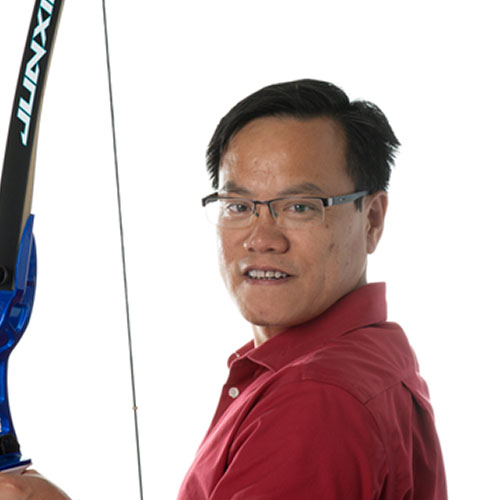 duo cai team member at orases holding an archery bow