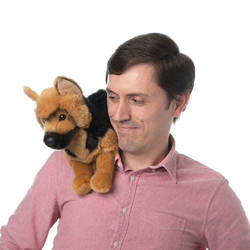 trevor philip team member at orases with a stuffed animal dog on his shoulder