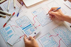 UX designer creating a wireframe for a custom web application