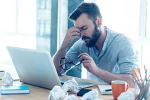 Man frustrated by the inability to make changes to his ERP software