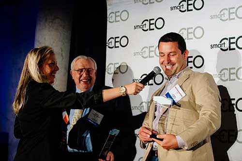 Nick receiving award from Baltimore SmartCEO Magazine