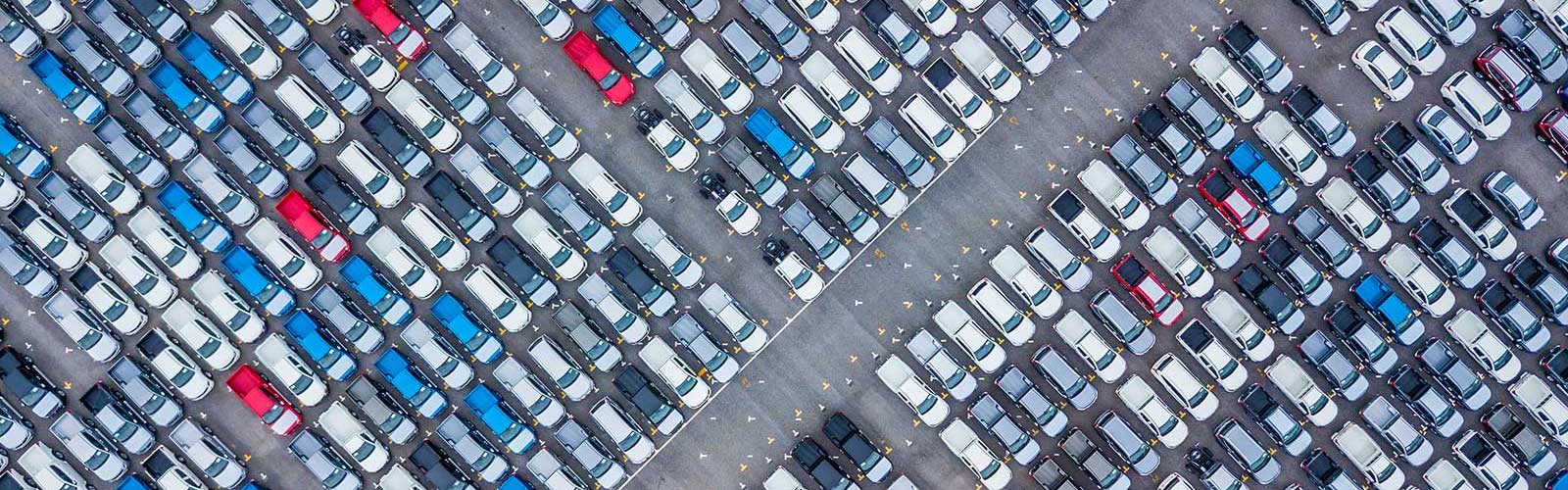 aerial view of cars at an automotive dealership