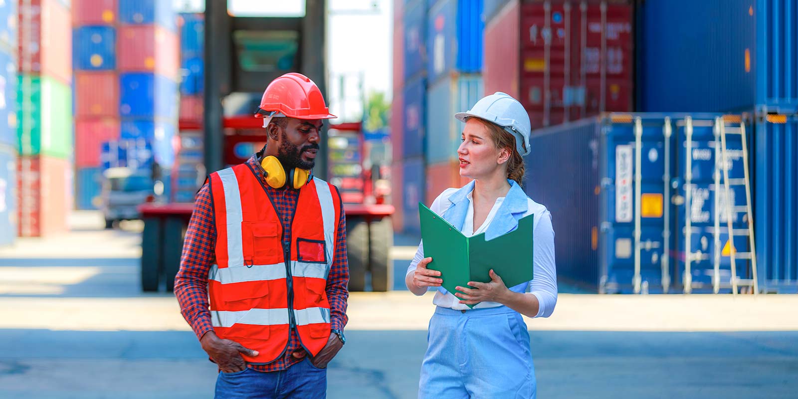 construction workers collaborating on supply chain management