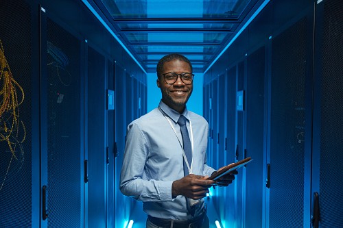 Smiling African American Man in Data Center