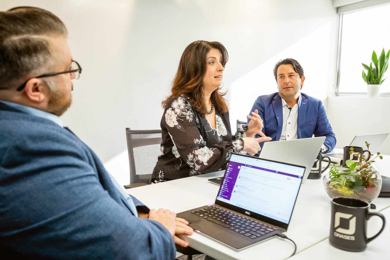team members at orases reviewing integration strategies for their medical software development services