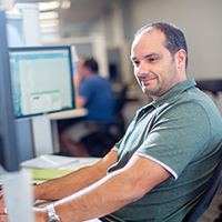 Orases team member in office