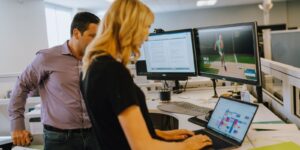 colleagues collaborating on a data migration project