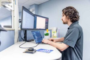 orases employee working on raas