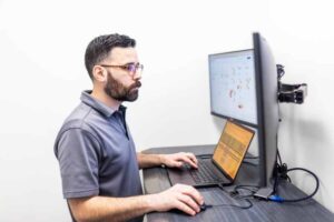orases employee at desk working on ai agent integration