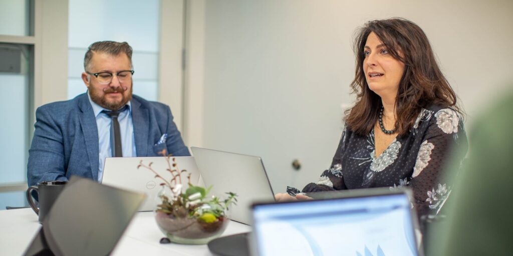 female employee during group meeting