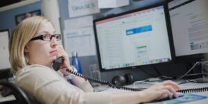 orases employee working and speaking over a phone