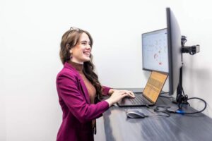 employee at standing desk