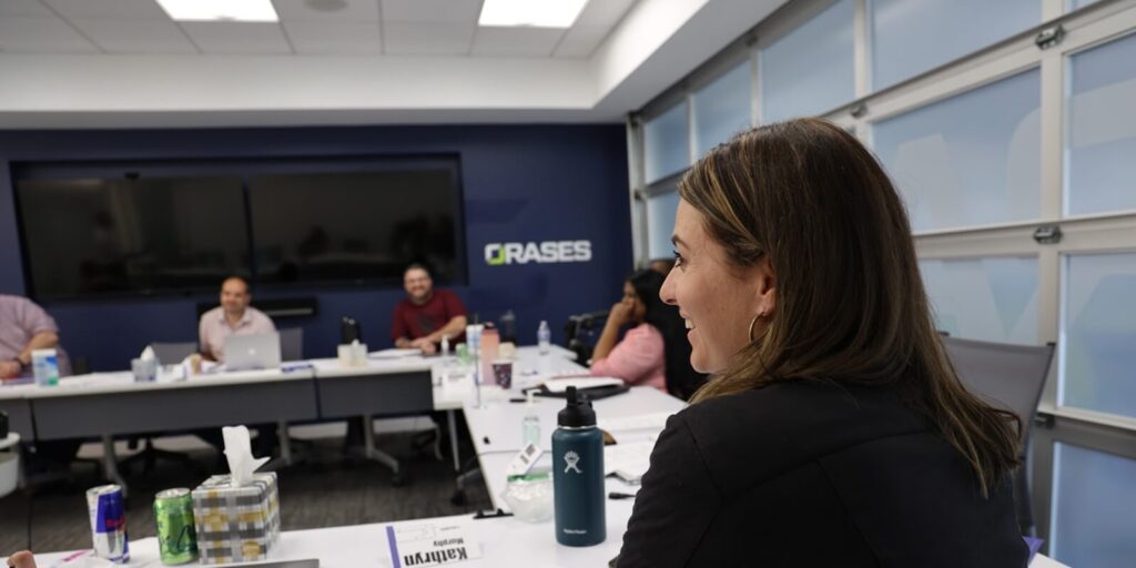 closeup of a female employee discussing Automated Data Extraction & Analysis