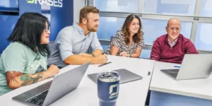 orases team members in a meeting