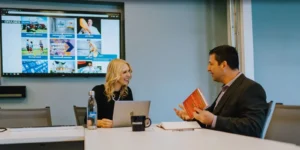 two orases members smiling during discussion