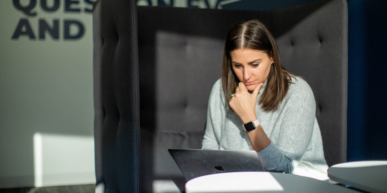 concentrated female employee in office