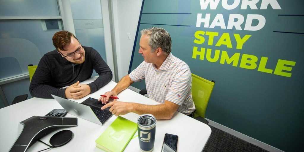colleagues engaged in a collaborative discussion at a modern office space