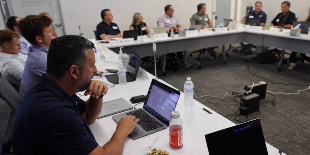 orases team members in a meeting